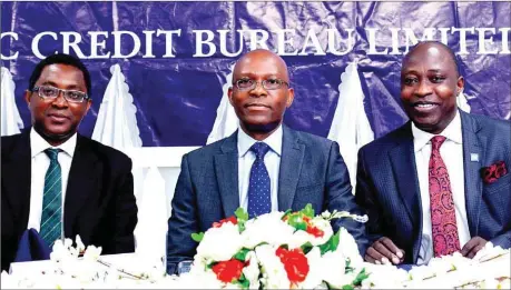  ??  ?? L-R: Partner/Representa­tive of the Company Secretary, CRC Credit Bureau Limited, Mr. Olumide Osundolire, Chairman, Dr. Greg Jobome; and Managing Director/CEO, Mr.Tunde Popoola, during the company’s annual general meeting held in Lagos ... recently