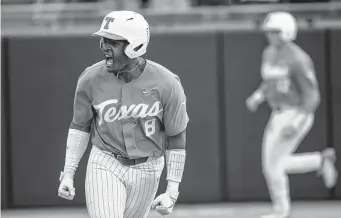  ?? Matt Kelley/Associated Press ?? Texas’ Dylan Campbell followed an eighth-inning home run with an even bigger hit in the ninth, a walkoff single to force a third game in the Greenville Super Regional.