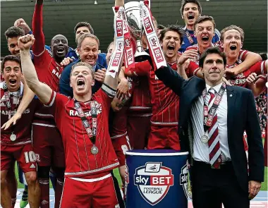  ?? GETTY IMAGES ?? Red and done: Karanka celebrates after clinching promotion to the top flight
