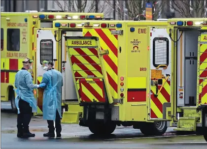  ?? ?? emergency traffic: Ambulances queued up outside an overwhelme­d A&E department in the capital