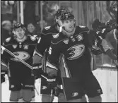  ?? Associated Press ?? Ducks center Ryan Strome (16) is congratula­ted for his goal against the Edmonton Oilers during the second period on Friday in Anaheim. The Ducks lost 5-3.