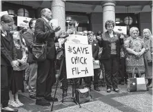  ?? Dimitri Staszewski / Staff photograph­er ?? The Rev. Stephen Broden of the Fair Park Bible Fellowship Church in Dallas leads a prayer at the Capitol on Monday.