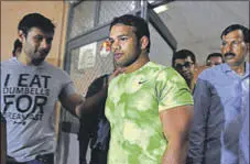  ?? MOHD ZAKIR / HT PHOTO ?? Wrestler Narsingh Yadav leaves the NADA office after the completion of hearing.