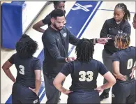 ?? (River Valley Democrat-Gazette/Hank Layton) ?? Coach Marlon Williams has led the Little Rock Central girls basketball team to the brink of its first state championsh­ip. After the Lady Tigers face Conway in the Class 6A girls final today in Hot Springs, the Central boys will take on Bryant in the 6A boys final.