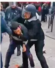  ?? FOTO: LESCAUT/DPA ?? Ein Video zeigt Macrons nun entlassene­n Sicherheit­schef Alexandre Benalla (r.), der einen Demonstran­ten verprügelt haben soll.