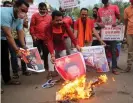  ?? Photograph: Sanjeev Gupta/EPA ?? Activists stage a protest against China in Bhopal, India, on Tuesday. Public opinion may make calming tensions difficult.