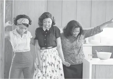  ??  ?? (From left) Janelle Monae, Taraji P. Henson and Octavia Spencer in ‘Hidden Figures’. — Photo courtesy of Twentieth Century Fox