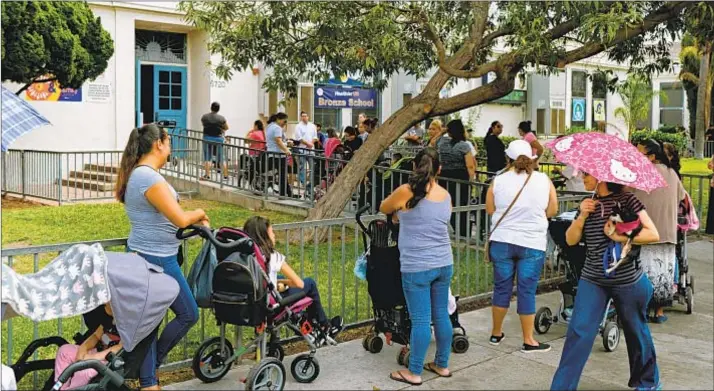  ??  ?? MILES AVENUE Elementary is one of the 11 public schools in the Huntington Park boundaries. Affordable housing costs are a plus for families moving into the area.