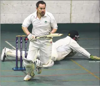  ?? Picture: Chris Davey FM4578862 Buy this picture from kentonline.co.uk ?? Street End 2nds’ Luke Blake runs off a wide to seal the win with Whitstable 2nds keeper Philip Marsh at full stretch