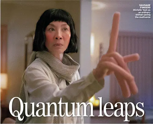  ?? ?? SAUSAGE FINGERS Michelle Yeoh as an ordinary woman saving the multiverse