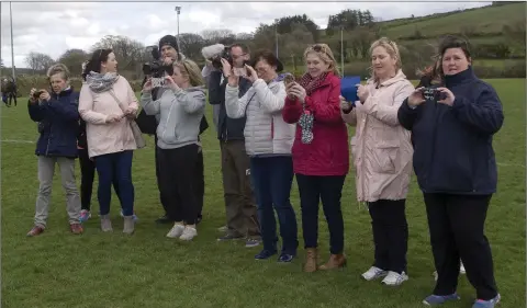  ??  ?? Proud parents and photograph­ers snap their photos of the Ballymanus under-15 football team after they had played Annacurra as the curtain-raiser for the Wicklow v Limerick inter-county game on the occasion of the official opening of the Ballymanus GAA...