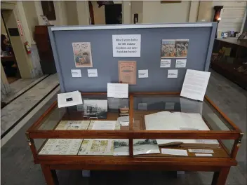  ?? COURTESY OF KATIE BUESCH ?? Pictured is a display case talking about the 1885 Chinese Expulsion in Eureka, along with a display featuring political cartoons and informatio­n on the larger forces that created a climate where the expulsion was seen as acceptable and praised, said Clarke Museum Interim Director Katie Buesch.