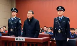  ??  ?? Zhao Shaolin, former secretary-general of the Jiangsu provincial Party Standing Committee, is sentenced to four years in prison for corruption and foreign currency fraud in October 2014, eight years after he retired