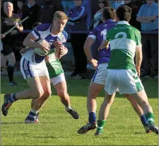  ??  ?? Tommy Walsh, Kerins O’Rahillys, in possession against Legion