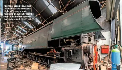  ?? CLIVE HANLEY ?? ‘Battle of Britain’ No. 34070 Manston makes an unusual sight at Tyseley’s open weekend on June 30, with the front of its frames removed for replacemen­t.