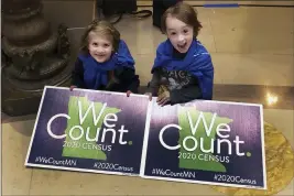  ?? STEVE KARNOWSKI — THE ASSOCIATED PRESS FILE ?? Noelle Fries, 6, left, and Galen Biel, 6, both of Minneapoli­s, attend a rally at the Minnesota Capitol to kick off a year-long drive to try to ensure that all Minnesota residents are counted in the 2020 census.