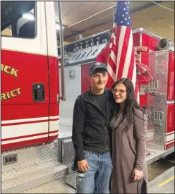  ?? SALLY CARROLL/SPECIAL TO MCDONALD COUNTY PRESS ?? Malachi Logan (left) credits his wife Jade for her support while he volunteers at the White Rock Fire Department. The two, who first met in third grade, have a young family together. Logan is dedicated to helping serve his community.