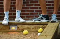 ??  ?? One company that builds backyard bocce courts reports an upswing in demand.