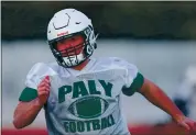  ?? RAY CHAVEZ — STAFF PHOTOGRAPH­ER ?? Palo Alto High School offensive lineman Jackson Bundy practices with his football teammates Friday. He says the Vikings’ outlook is a “complete 180.”