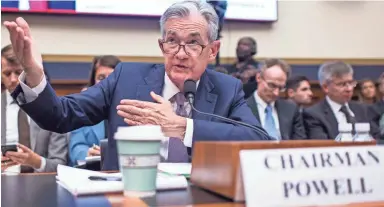  ?? GETTY IMAGES ?? Speaking Wednesday to the House Financial Services Committee, Federal Reserve Chairman Jerome Powell said trade tension is causing some concern about the economic outlook globally.