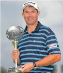  ?? Picture: Getty. ?? Padraig Harrington with the trophy.