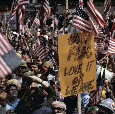  ?? BURT GLINN/MAGNUM PHOTOS/TRIBUNE NEWS SERVICE ?? “Hard-Hats” demonstrat­e in favour of the Vietnam War in a scene in Ken Burns’ new documentar­y, The Vietnam War.