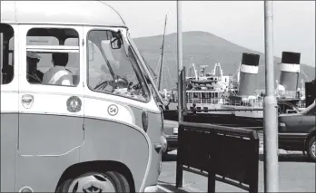  ?? B27twe05 ?? Old and old together but still working and very popular today. Visiting Brodick was the David MacBrayne bus with the even older Waverley behind it.