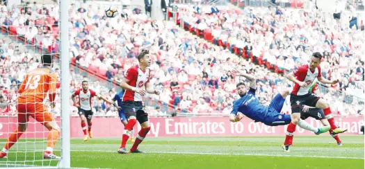  ?? Reuters ?? Chelsea’s Olivier Giroud attempts an overhead kick during their FA Cup semi-final match against Southampto­n in London on Sunday.