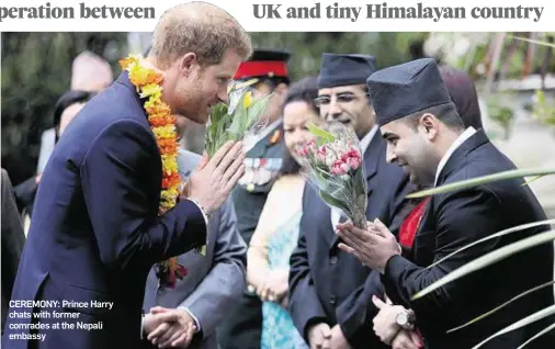  ??  ?? CEREMONY: Prince Harry chats with former comrades at the Nepali embassy