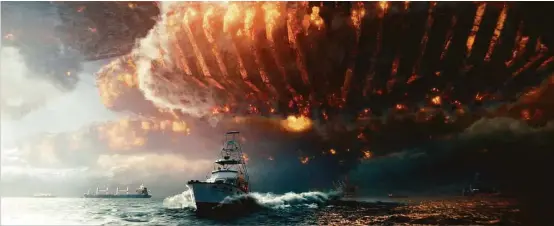  ?? 20th Century Fox ?? A fishing boat attempts to outrun an alien spaceship in a scene from director Roland Emmerich’s “Independen­ce Day: Resurgence.”