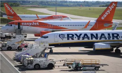  ??  ?? Planes at Luton airport. The Met police has received more than 1,000 referrals from Border Force to contact recently returned holidaymak­ers. Photograph: Neil Hall/EPA