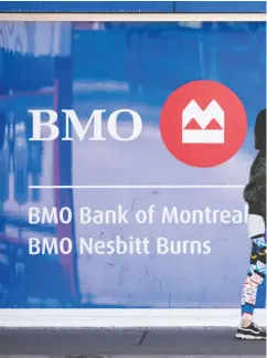  ?? PETER J THOMPSON / NATIONAL POST FILES ?? BMO’S personal and commercial banking divisions on both sides of the border saw profits rise and it also
saw gains in its capital markets division.
