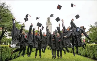  ?? JAY JANNER / AMERICAN-STATESMAN ?? These University of Texas engineerin­g graduates celebrate before commenceme­nt in May. According to a new study they have plenty to be happy about — architectu­re and engineerin­g is the highest-paying major in the UT System.