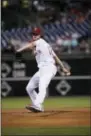  ?? MATT SLOCUM — THE ASSOCIATED PRESS ?? Phillies pitcher Aaron Nola was on target again Monday night against the Nationals, likely finishing up an impressive season.