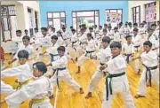  ??  ?? Kids train at Multi Activity Centre ground ahead of Medhaj Cup Karate Championsh­ip beginning in Lucknow on Sunday