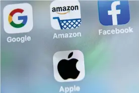  ?? Photograph: Denis Charlet/AFP/Getty Images ?? Lawmakers have released a nearly 500-page report after a 16-month inquiry into major tech companies.