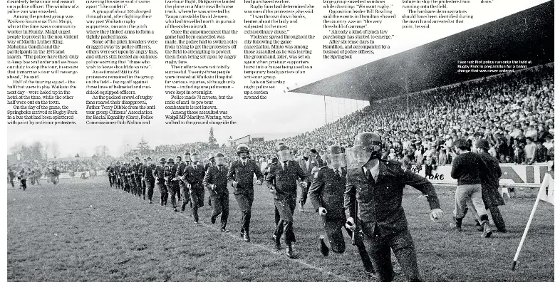  ?? STUFF ?? I see red: Riot police run onto the field at Rugby Park in preparatio­n for a baton charge that was never ordered.