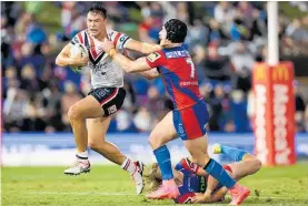  ?? Photo / Getty Images ?? Joseph Manu set a running metres record against the Knights.
