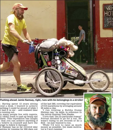  ??  ?? Pushing ahead: Jamie Ramsay, right, runs with his belongings in a stroller