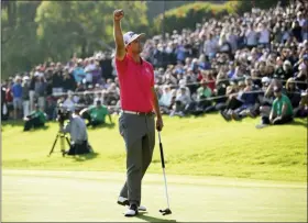  ?? RYAN KANG — THE ASSOCIATED PRESS ?? Adam Scott, of Australia, reacts after finishing the Genesis Invitation­al at Riviera Country Club Sunday in the Pacific Palisades area of Los Angeles.