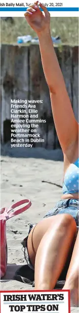  ??  ?? Making waves: Friends Ava Clarkin, Ellie Harmon and Amiee Cummins enjoying the weather on Portmarnoc­k Beach in Dublin yesterday