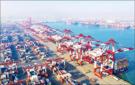  ??  ?? A view of the container port in Qingdao in eastern China’s Shandong province on Jan 14. China’s exports rose 0.5% in 2019 despite a tariff war with Washington after growth rebounded in December on stronger demand from other markets. The Trump administra­tion dropped its designatio­n of China as a currency manipulato­r in advance of the signing Wednesday of a Phase 1
US-China trade agreement. (AP)