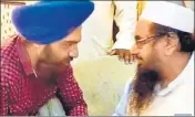  ??  ?? Sikh militant leader Gopal Singh Chawla with Lashkareta­iba chief Hafiz Saeed in an undated photograph.