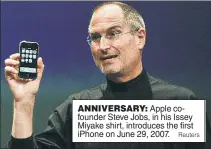  ?? Reuters ?? ANNIVERSAR­Y: Apple cofounder Steve Jobs, in his Issey Miyake shirt, introduces the first iPhone on June 29, 2007.