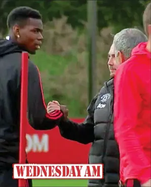  ??  ?? Pogba greets media officer John Allen but Mourinho calls him back