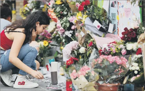  ??  ?? Hundreds of tributes have been left at Notting Hill Methodist Church in west London to the victims of the Grenfell Tower disaster.