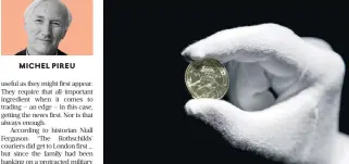  ??  ?? Heritage: A worker displays a commemorat­ive 2.5 euro coin with the Lion's Mound, to mark the bicentenni­al of the battle of Waterloo, at Belgium's Royal Mint in Brussels in, 2015. /Reuters