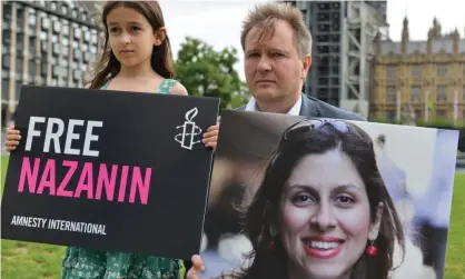  ?? Photograph: Thomas Krych/Sopa Images/Rex/Shuttersto­ck ?? Gabriella Ratcliffe and Richard Ratcliffe in Parliament Square last month.