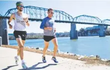  ?? CONTRIBUTE­D PHOTO ?? As he continues to wrestle with a terminal diagnosis, brain cancer patient Nathan Sexton, left, takes a run with Alan Outlaw, the owner of Fast Break Athletics.