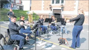  ?? GLEN WHIFFEN/THE TELEGRAM ?? The Memorial University Brass Ensemble performs during a ceremony dedicating the Memorial on Parade Parkette Wednesday at Fort Townshend in St. John’s.